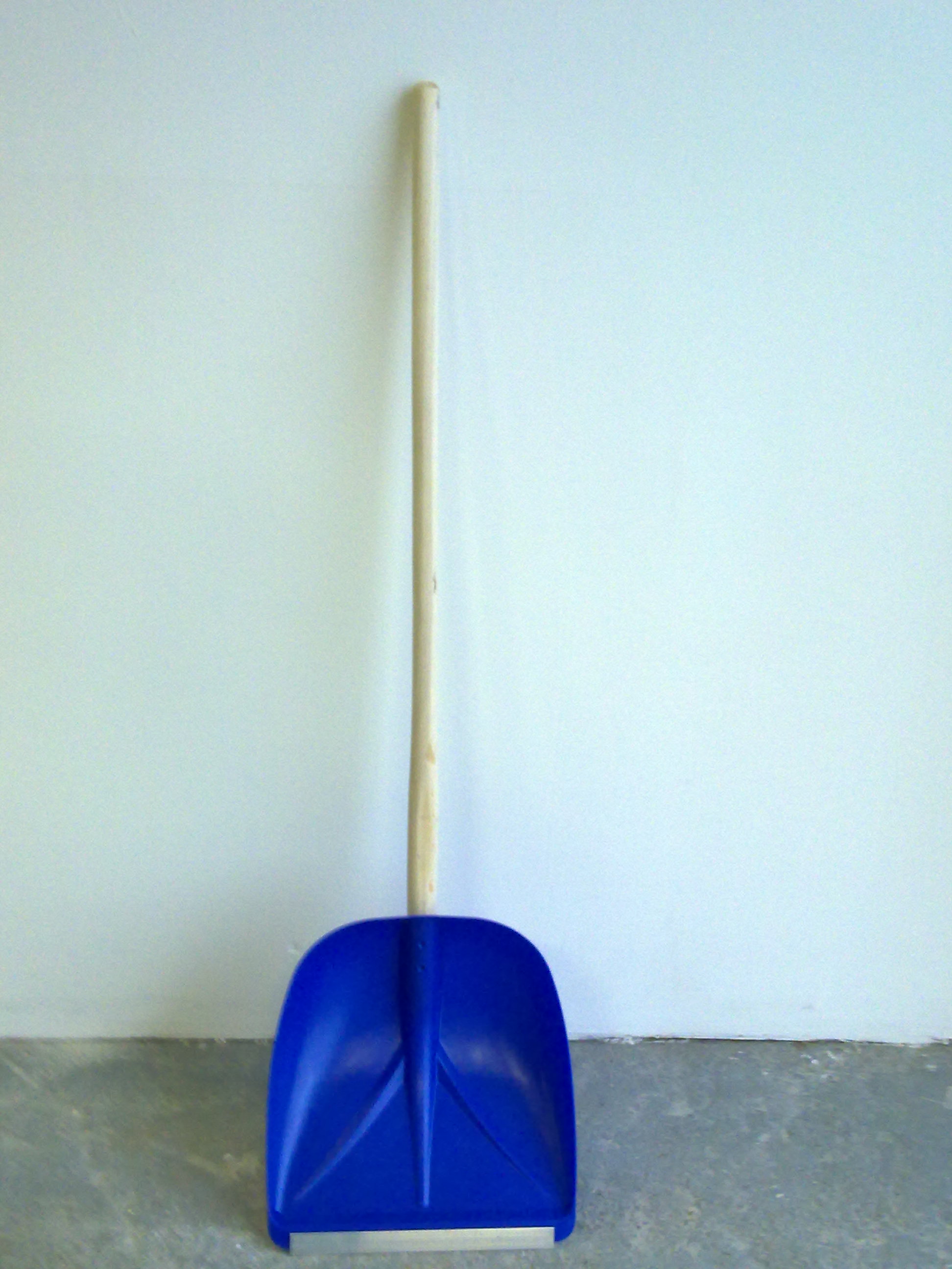 Plastic snow shovel with edge protector